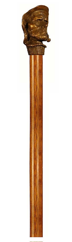 Bastón de bronce macizo "Marinero con pipa". Palo madera de haya color nogal. Contera de goma.