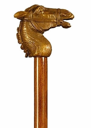 Bastón de bronce macizo "Caballo con riendas". Palo madera de haya color nogal. Contera de goma.