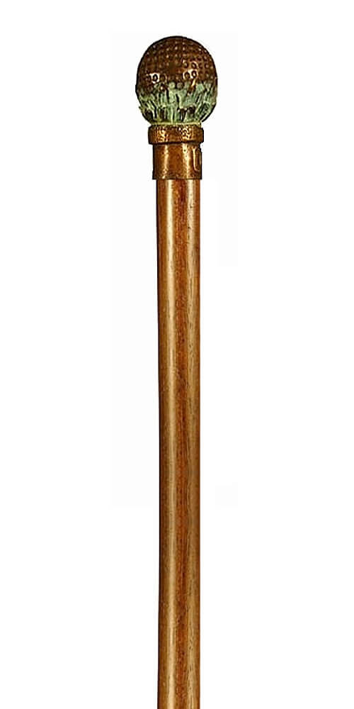 Bastón de bronce macizo "Bola de golf". Palo madera de haya color nogal. Contera de goma.
