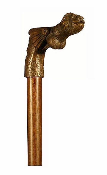 Bastón de bronce macizo "Gárgola de león". Palo madera de haya color nogal. Contera de goma.