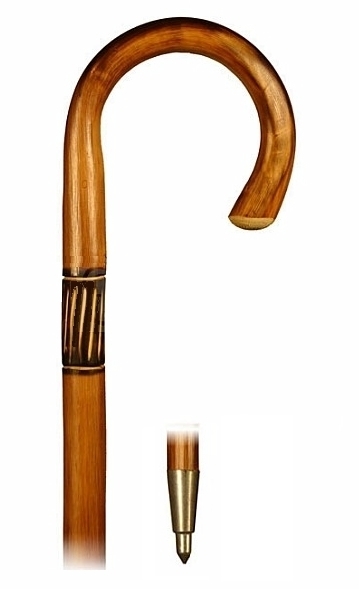 Bastón curvo madera de Castaño flamejado y talla. Contera de goma o puntera metálica pincho.