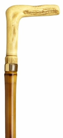 Bastón con empuñadura hueso africano. Palo caña de bambú. Contera de goma.