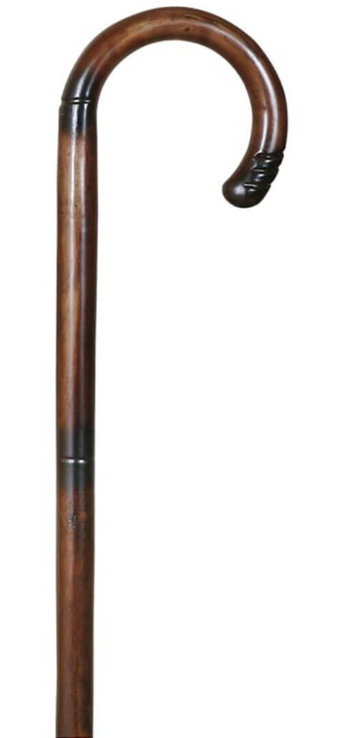 Bastón curvo madera de castaño de 1 sola pieza con dibujo torneado. Contera de goma.