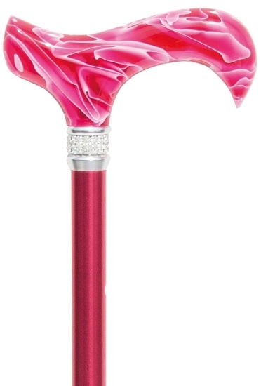 Bastón extensible rosa con anillo de cristales brillantes. Regulable de 70 y 92 cm. Contera de goma.