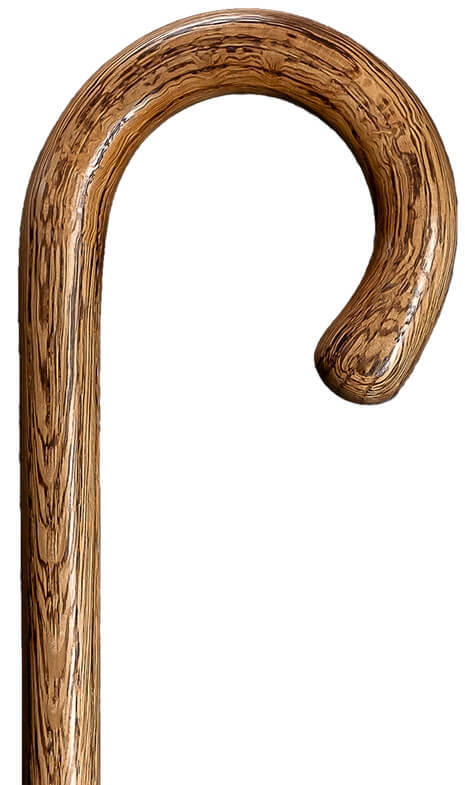 Bastón curvo, hecho a mano, de 1 sola pieza en madera de roble. Contera de goma.