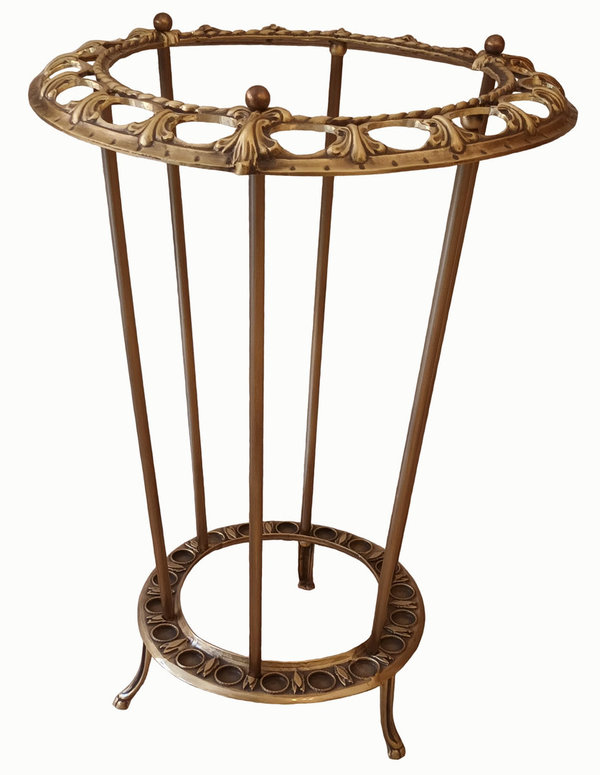 Expositor / Bastonero circular de bronce macizo para 18 bastones. Medidas: 39 x 39 x 56 cm.