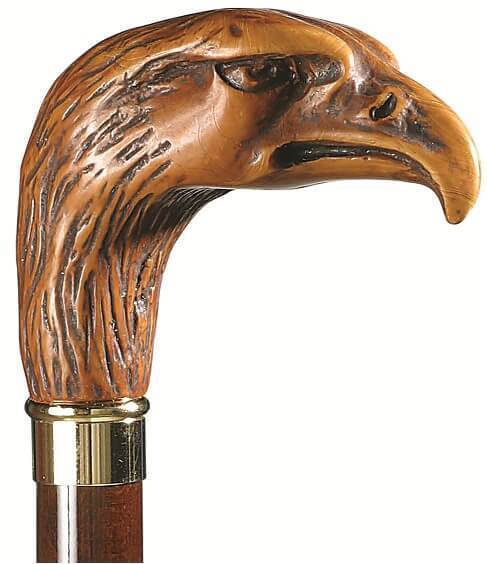 Bastón cabeza de águila símil madera. Palo madera de haya color nogal. Contera de goma.